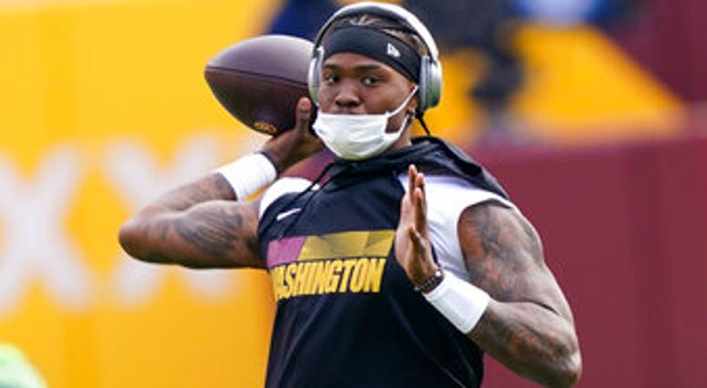 Washington Football Team quarterback Dwayne Haskins warming up before the start of an NFL football game against the Seattle Seahawks, Sunday, Dec. 20, 2020, in Landover, Md. (AP Photo/Susan Walsh) Washington Football Team quarterback Dwayne Haskins warming up before the start of an NFL football game against the Seattle Seahawks, Sunday, Dec. 20, 2020, in Landover, Md. (AP Photo/Susan Walsh)