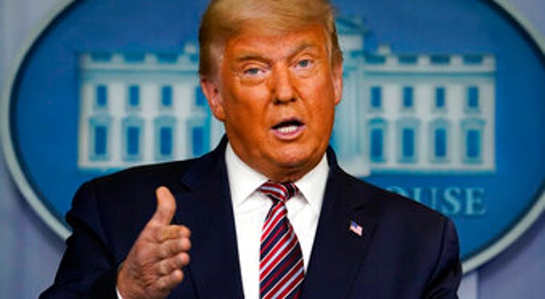 FILE - In this Nov. 5, 2020, file photo President Donald Trump speaks at the White House in Washington. (AP Photo/Evan Vucci, File) FILE - In this Nov. 5, 2020, file photo President Donald Trump speaks at the White House in Washington. (AP Photo/Evan Vucci, File)