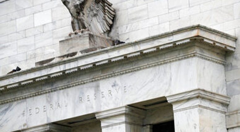 FILE - This May 22, 2020, file photo shows the Federal Reserve building in Washington. (AP Photo/Patrick Semansky, File) FILE - This May 22, 2020, file photo shows the Federal Reserve building in Washington. (AP Photo/Patrick Semansky, File)