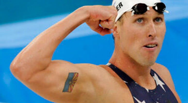FILE - In this Tuesday, Aug. 12, 2008 file photo, United States' relay swimmer Klete Keller reacts after a men's 4x200-meter freestyle relay heat during the swimming competitions at the Beijing 2008 Olympics in Beijing. (AP Photo/Thomas Kienzle, File) FILE - In this Tuesday, Aug. 12, 2008 file photo, United States' relay swimmer Klete Keller reacts after a men's 4x200-meter freestyle relay heat during the swimming competitions at the Beijing 2008 Olympics in Beijing. (AP Photo/Thomas Kienzle, File)