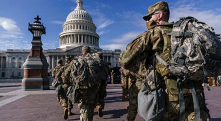National Guard troops reinforce security around the U.S. Capitol ahead of expected protests leading up to President-elect Joe Biden's inauguration. (AP Photo/J. Scott Applewhite) National Guard troops reinforce security around the U.S. Capitol ahead of expected protests leading up to President-elect Joe Biden's inauguration. (AP Photo/J. Scott Applewhite)