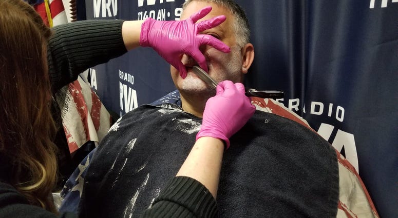 Detective Grant getting shaved