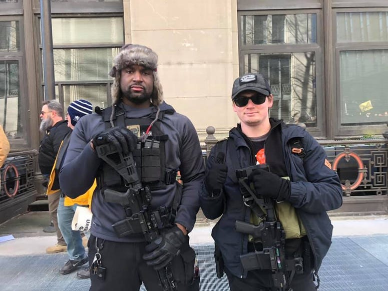 Tayji Tucker of Richmond and Robert Dean of Harrisonburg show off their weapons during the Gun Rights Rally on Janaury 20,2020. (Matt Demlein, WRVA) Tayji Tucker of Richmond and Robert Dean of Harrisonburg show off their weapons during the Gun Rights Rally on Janaury 20,2020. (Matt Demlein, WRVA)