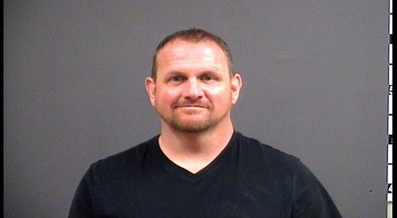 Thomas C. Acheson, 46, of Seattle, Washington, has been charged with malicious wounding, strangulation, threats to bomb, felony eluding, and felony vandalism. (Chesterfield Police)
