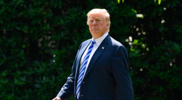 In this June 1, 2018, photo, President Donald Trump walks to Marine One on the South Lawn of the White House in Washington, as he heads to Camp David for the weekend. Lawyers for President Donald Trump and Summer Zervos, a former “Apprentice” contestant w