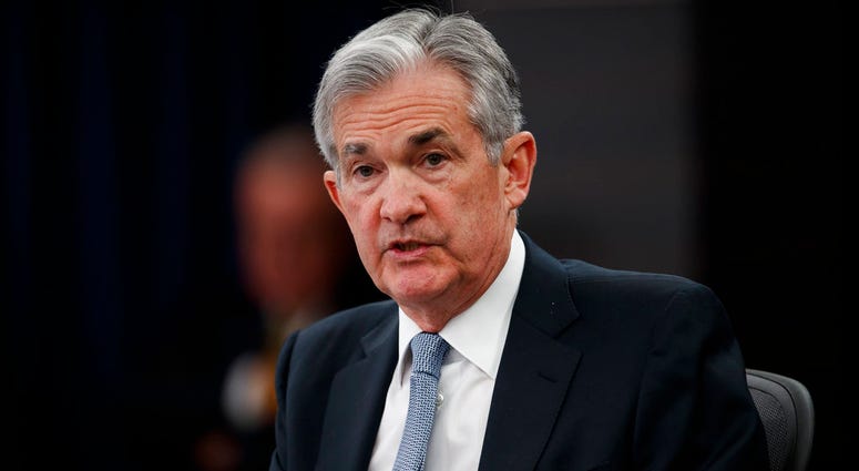 FILE- In this March 21, 2018, file photo, Federal Reserve Chairman Jerome Powell speaks following the Federal Open Market Committee meeting in Washington. Investors are eagerly awaiting the updated economic forecasts the Fed will issue when its meeting en