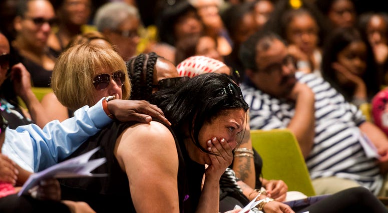 Michelle Kenney, the mother of Antwon Rose Jr., cries during the funeral service for her son at Woodland Hills Jr. High School, Monday, June 25, 2018, in Swissvale, Pa. The funeral comes six days after the 17-year-old was fatally shot by a police officer