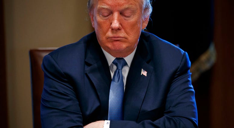 President Donald Trump listens during a meeting with Republican lawmakers in the Cabinet Room of the White House, Tuesday, June 26, 2018, in Washington. (AP Photo/Evan Vucci)