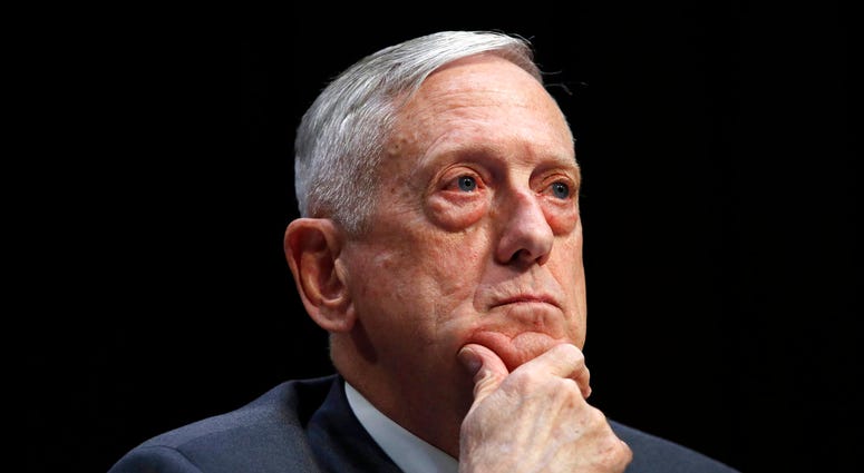 FILE - In this April 26, 2018, file photo, Defense Secretary Jim Mattis listens to a question during a hearing on Capitol Hill in Washington. The Trump administration’s request for the Pentagon to house migrants detained at the U.S. southern border and ev