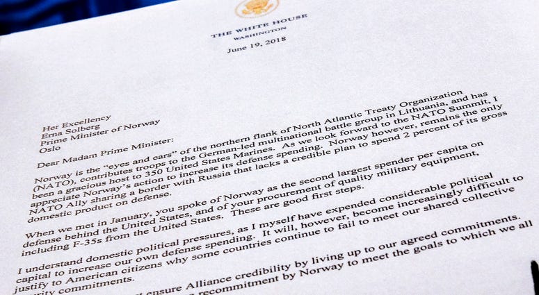 A copy of a letter sent to the Prime Minister Erna Solberg of Norway by U.S. President Donald Trump demanding an increase in Norway's NATO spending is photographed in Washington, Tuesday, July 3, 2018. The letter was supplied to the Associated Press by th