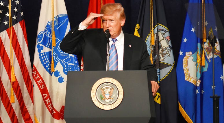 President Donald Trump looks at members of the audience during his remarks at a Salute to Service charity dinner in conjunction with the PGA Tour's Greenbrier Classic at The Greenbrier in White Sulphur Springs, W.Va. (AP Photo/Matt) President Donald Trump looks at members of the audience during his remarks at a Salute to Service charity dinner in conjunction with the PGA Tour's Greenbrier Classic at The Greenbrier in White Sulphur Springs, W.Va. (AP Photo/Matt)