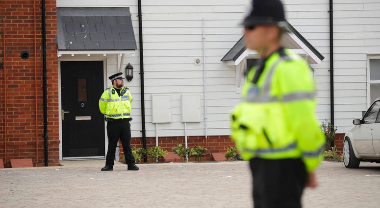 British police officers stand outside a residential property in Amesbury, England, Wednesday, July 4, 2018 . (AP Photo/Matt Dunham) British police officers stand outside a residential property in Amesbury, England, Wednesday, July 4, 2018 .(AP Photo/Matt Dunham)