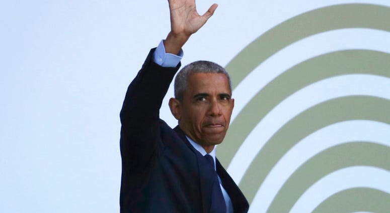 Former US President Barack Obama arrives at the Wanderers Stadium in Johannesburg, South Africa, Tuesday, July 17, 2018 to deliver the 16th Annual Nelson Mandela Lecture. (AP Photo/Themba Hadebe)