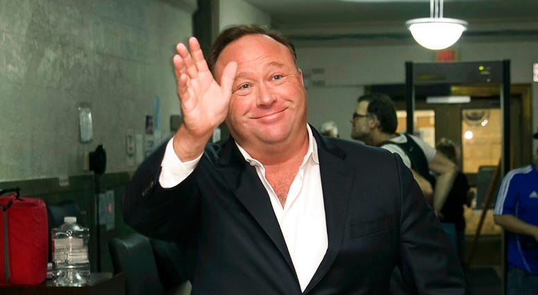 In this April 19, 2017, file photo, Alex Jones, a right-wing radio host and conspiracy theorist, arrives at the courthouse in Austin, Texas. (Jay Janner/Austin American-Statesman via AP, File)