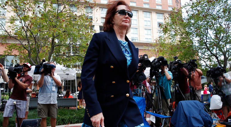 Kathleen Manafort, walks into federal court during the second day of jury deliberations in the trial of the former Donald Trump campaign chairman, in Alexandria, Va., Friday, Aug. 17, 2018. (AP Photo/Jacquelyn Martin)