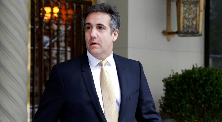 Michael Cohen, former personal lawyer to President Donald Trump, leaves his apartment building, in New York, Tuesday, Aug. 21, 2018.
