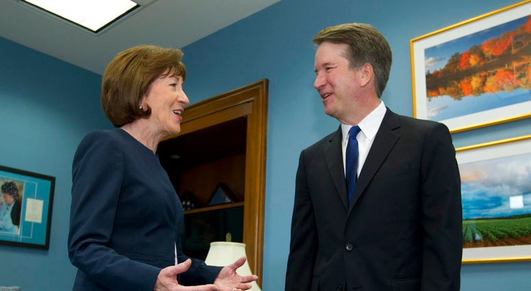 Sen. Susan Collins, R-Maine, speaks with Supreme Court nominee Judge Brett Kavanaugh at her office, before a private meeting on Capitol Hill in Washington on Tuesday, Aug. 21, 2018. (AP Photo/Jose Luis Magana)