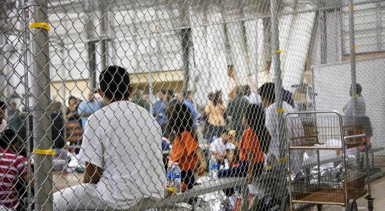 People who've been taken into custody related to cases of illegal entry into the United States, sit in one of the cages at a facility in McAllen, Texas. (U.S. Customs and Border Protection's Rio Grande Valley Sector via AP, File)