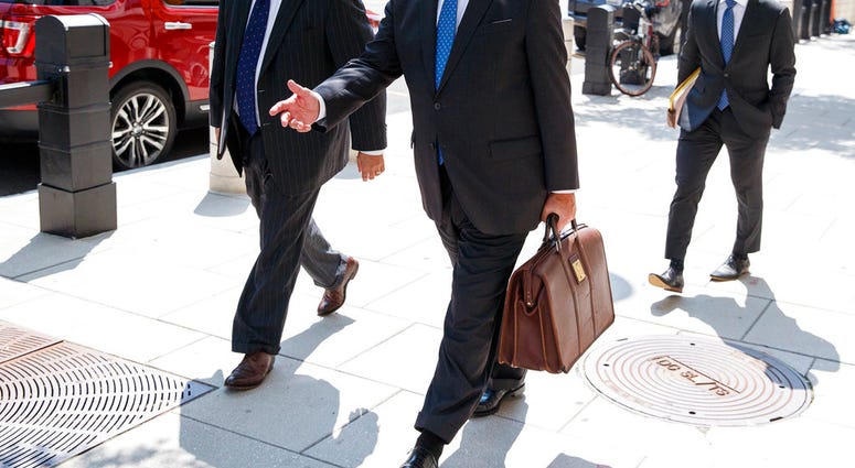 Richard Westling, left, and Thomas Zehnle, center, with the defense team for Paul Manafort, leave federal court in Washington, Tuesday, Aug. 28, 2018.(AP Photo/Carolyn Kaster) Richard Westling, left, and Thomas Zehnle, center, with the defense team for Paul Manafort, leave federal court in Washington, Tuesday, Aug. 28, 2018.(AP Photo/Carolyn Kaster)