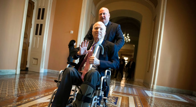 FILE - In this Dec. 1, 2017, file photo, Sen. John McCain, R-Ariz., leaves a closed-door session on Capitol Hill in Washington. (AP Photo/J. Scott Applewhite, File) FILE - In this Dec. 1, 2017, file photo, Sen. John McCain, R-Ariz., leaves a closed-door session on Capitol Hill in Washington. (AP Photo/J. Scott Applewhite, File)