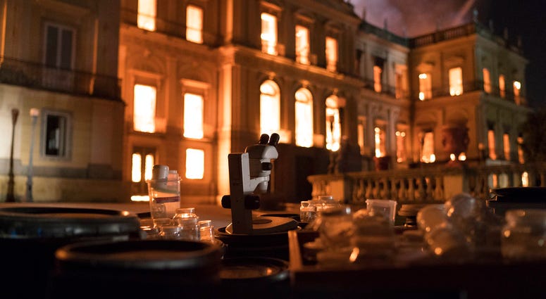 Firefighters work the fire at the 200-year-old National Museum of Brazil, in Rio de Janeiro, Brazil, Sunday, Sept. 2, 2018.