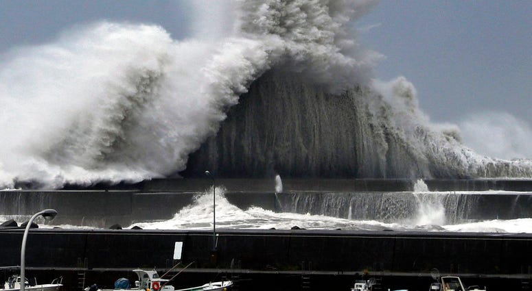 High waves hit breakwaters at a port of Aki, Kochi prefecture, Japan, Tuesday, Sept. 4, 2018. Powerful Typhoon Jebi