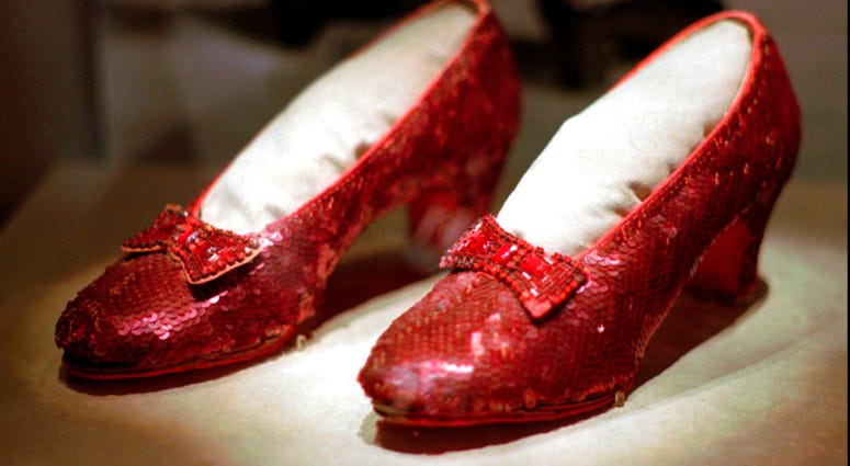 This April 10, 1996, file photo shows one of the four pairs of ruby slippers worn by Judy Garland in the 1939 film "The Wizard of Oz" on display during a media tour of the "America's Smithsonian" traveling exhibition in Kansas City, Mo.(AP Photo/Ed Zurga)