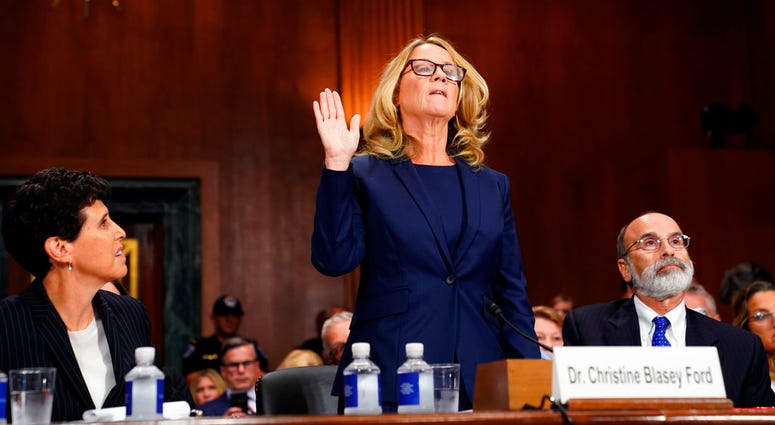 Christine Blasey Ford is sworn in to testify before the Senate Judiciary Committee on Capitol Hill in Washington, Thursday, Sept. 27, 2018. (AP Photo/Andrew Harnik, Pool)