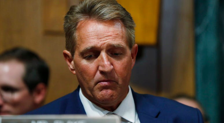 Sen. Jeff Flake, R-Ariz., listens during a meeting of the Senate Judiciary Committee, Friday, Aug. 28, 2018 on Capitol Hill in Washington. (AP Photo/Pablo Martinez Monsivais)