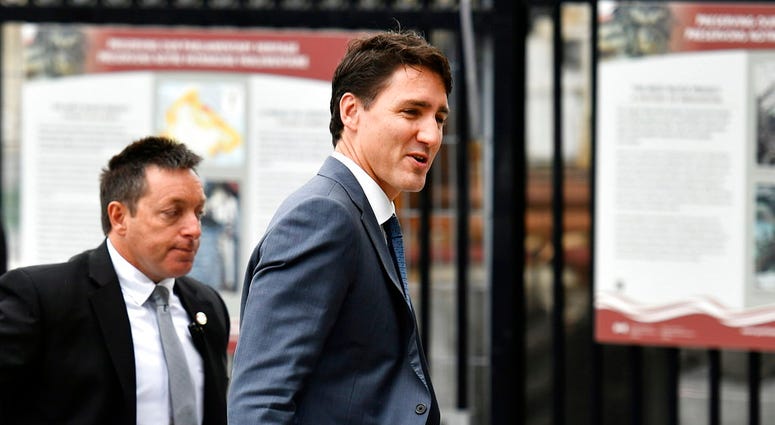 Canadian Prime Minister Justin Trudeau arrives on Parliament Hill in Ottawa, Ontario on Monday, Oct. 1, 2018. (Justin Tang/The Canadian Press via AP)