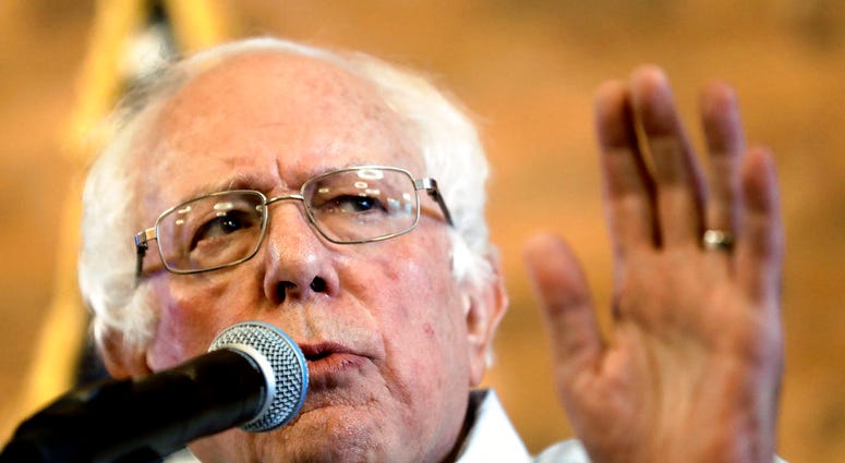 In this Aug. 17, 2018, file photo, U.S. Sen. Bernie Sanders, I-Vt, gestures as he speaks during a campaign stop for Democratic gubernatorial hopeful Andrew Gillum in Tampa, Fla.