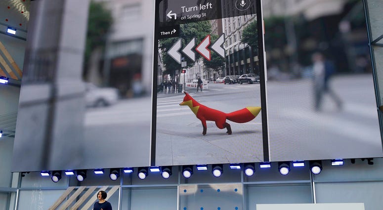 In this May 8, 2018 file photo, Google's Aparna Chennapragada speaks at the Google I/O conference in Mountain View, Calif. Google is expected to introduce two new smartphones
