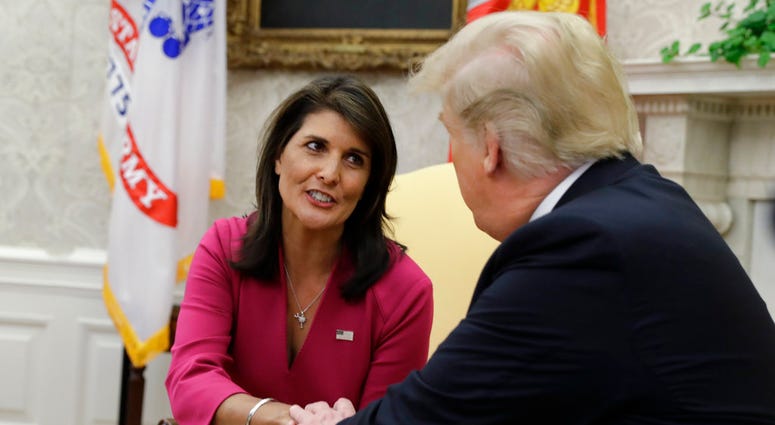 President Donald Trump meets with outgoing U.S. Ambassador to the United Nations Nikki Haley in the Oval Office of the White House, Tuesday, Oct. 9, 2018, in Washington. (AP Photo/Evan Vucci)