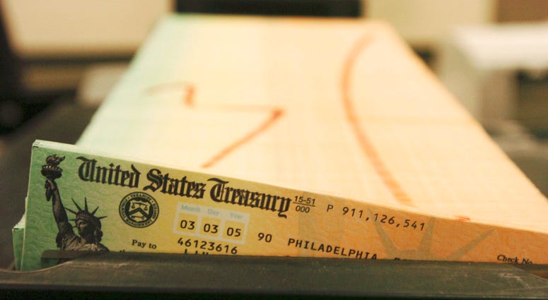 Trays of printed social security checks wait to be mailed from the U.S. Treasury's Financial Management services facility in Philadelphia.(AP Photo/Bradley C. Bower, File) Trays of printed social security checks wait to be mailed from the U.S. Treasury's Financial Management services facility in Philadelphia.(AP Photo/Bradley C. Bower, File)