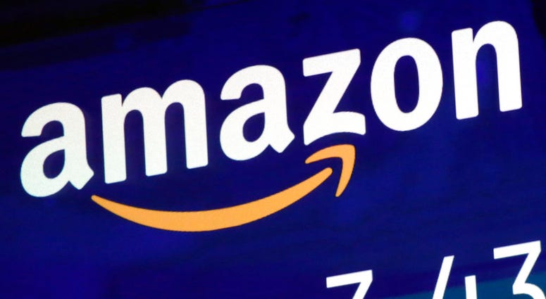 The logo for Amazon is displayed on a screen at the Nasdaq MarketSite in New York. (AP Photo/Richard Drew, File) The logo for Amazon is displayed on a screen at the Nasdaq MarketSite in New York. (AP Photo/Richard Drew, File)