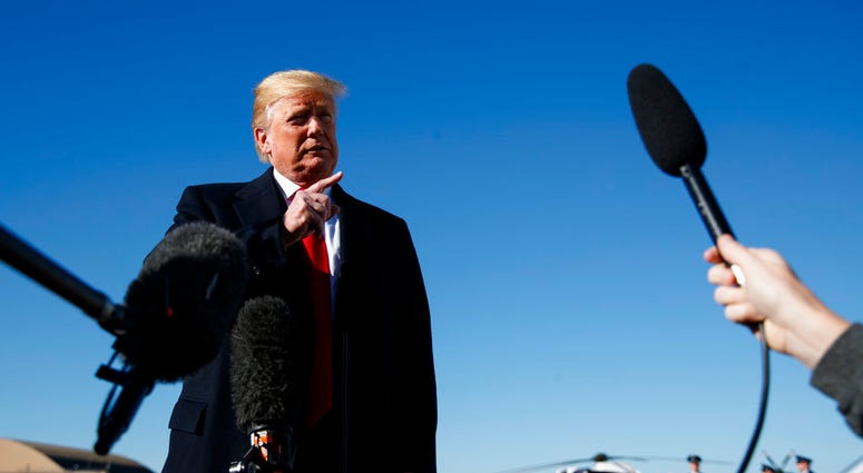President Trump talking to reporters