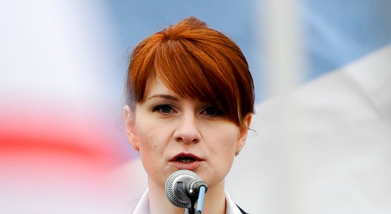 In this Sunday, April 21, 2013, file photo, Maria Butina, leader of a pro-gun organization in Russia, speaks to a crowd during a rally in support of legalizing the possession of handguns in Moscow, Russia.