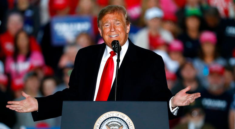 In this Oct. 27, 2018, photo, President Donald Trump speaks during a rally at Southern Illinois Airport in Murphysboro, Ill.
