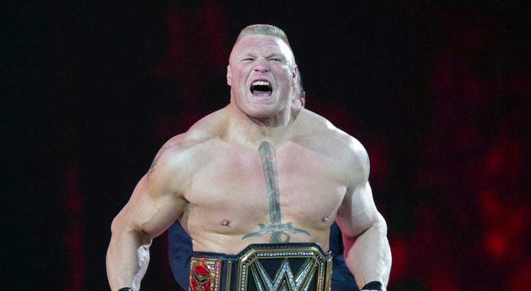 In this March 29, 2015, file photo, Brock Lesnar makes his entrance at Wrestlemania XXXI in Santa Clara, Calif. WWE is set to hold its Crown Jewel event Friday, Nov. 2, 2018, in Riyadh, Saudi Arabia, fans and politicians criticize WWE's decision