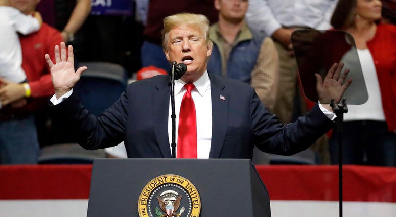 President Donald Trump speaks at a rally Sunday, Nov. 4, 2018, in Chattanooga, Tenn. (AP Photo/Mark Humphrey)