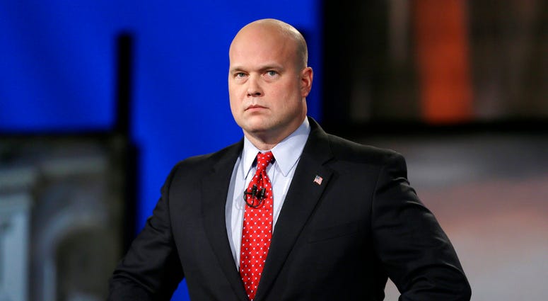In this April 24, 2014, file photo, then-Iowa Republican senatorial candidate and former U.S. Attorney Matt Whitaker watches before a live televised debate in Johnston, Iowa. (AP Photo/Charlie Neibergall, File)