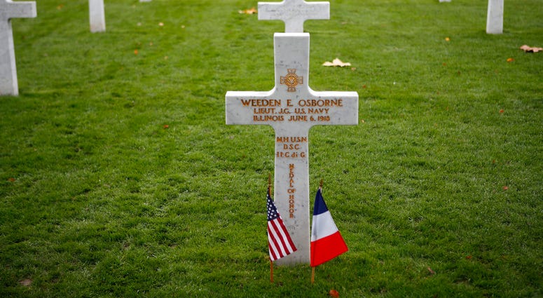 A soldier grave is pictured after a ceremony at the Aisne Marne American Cemetery near the Belleau Wood battleground, in Belleau, France, Saturday, Nov. 10, 2018