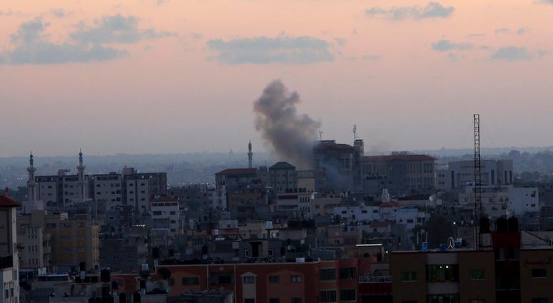 Smoke rises following Israeli strikes on Gaza City, Monday, Nov. 12, 2018. (AP Photo/Adel Hana)