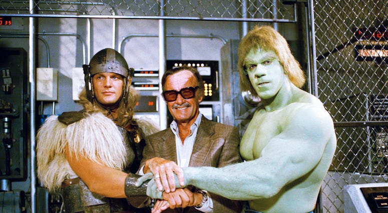 In this May 9, 1988, file photo, comics impresario Stan Lee, center, poses with Lou Ferrigno, right, and Eric Kramer who portray 'The Incredible Hulk' and Thor, respectively, in a special movie for NBC, 'The Incredible Hulk Returns,'