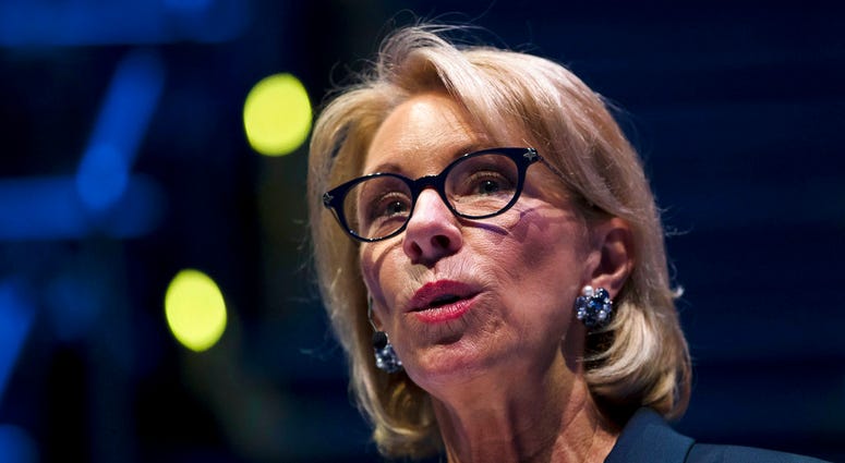 In this Sept. 17, 2018 photo, Education Secretary Betsy DeVos speaks during a student town hall at National Constitution Center in Philadelphia. (AP Photo/Matt Rourke)