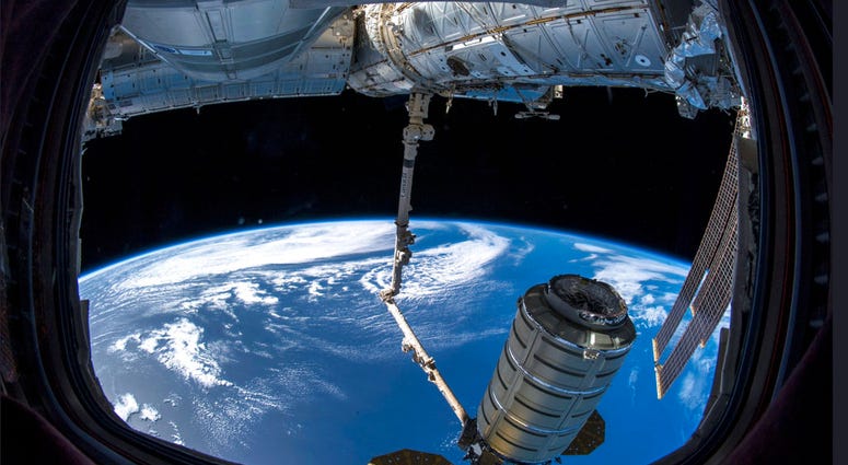 In this image provided by NASA, a commercial shipment arrives at the International Space Station on Monday, Nov. 19, 2018.