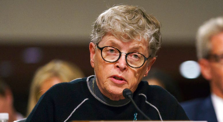 In this June 5, 2018 file photo, former Michigan State President Lou Anna Simon testifies before a Senate subcommittee in Washington. Simon has been charged with lying to police