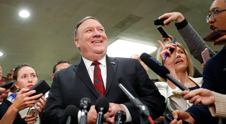 Secretary of State Mike Pompeo with reporters