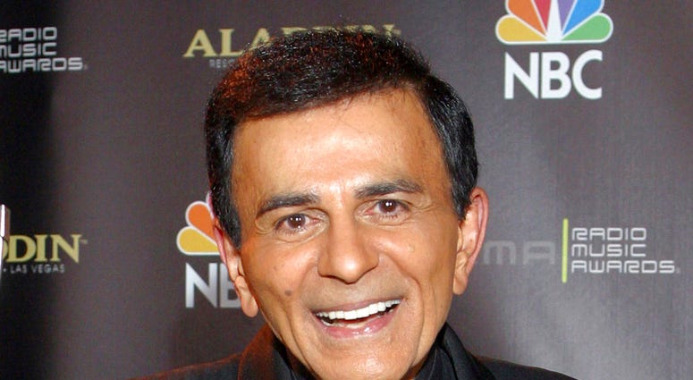 In this Oct. 27, 2003, file photo, Casey Kasem poses for photographers after receiving the Radio Icon award during The 2003 Radio Music Awards at the Aladdin Resort and Casino in Las Vegas.