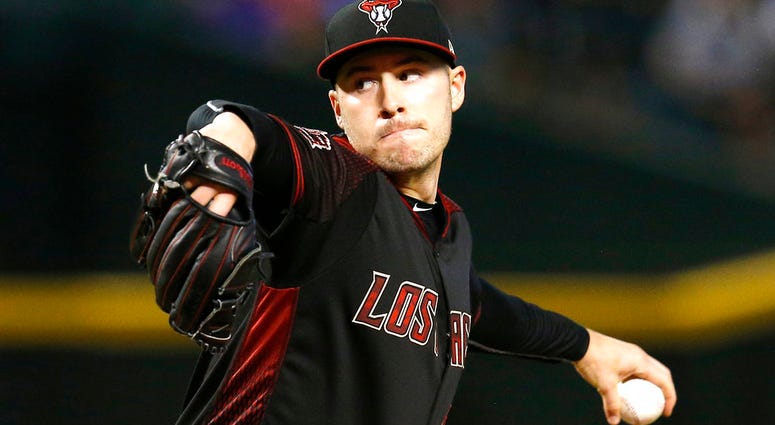 n this Sept. 22, 2018 file photo Arizona Diamondbacks pitcher Patrick Corbin throws in the first inning during a baseball game against the Colorado Rockies in Phoenix.